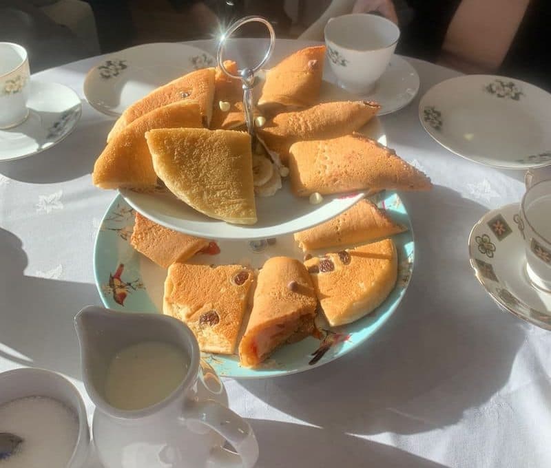 Residents Enjoying Pancake Day With Tea