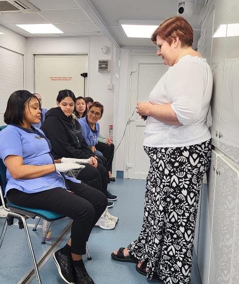 Rubislaw park care home staff in the mobile simulator.