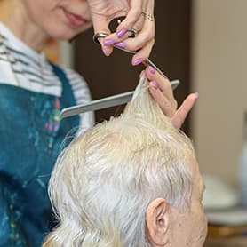 Resident Having Their Hair Cut