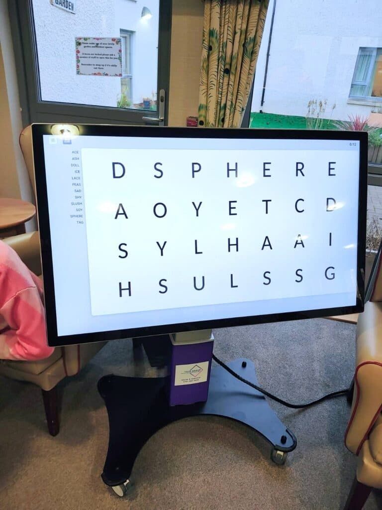 sensory play big ipad with a wordsearch on it