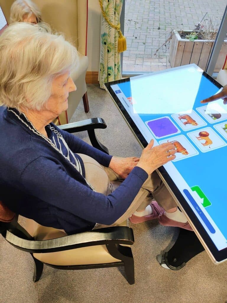 sensory play big ipad and resident playing a game